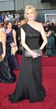 Melanie Griffith posando sobre la alfombra roja de