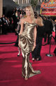 Stacy Keibler posando sobre la alfombra roja de lo