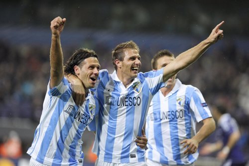 Joaquín y Demichelis celebran el triunfo ante el Anderlecht