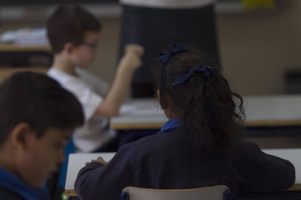 La imposibilidad de que alumnos regresasen a casa mantuvo colegios abiertos hasta media noche en Madrid